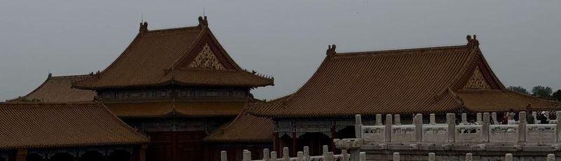 Golden-tiled roofs and marble balustrades inside the Forbidden City